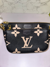 Load image into Gallery viewer, LOUIS VUITTON Multi Pochette Empreinte Bi Color
