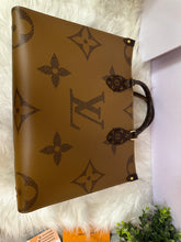 Load image into Gallery viewer, LOUIS VUITTON Reverse Monogram  On-The-Go MM
