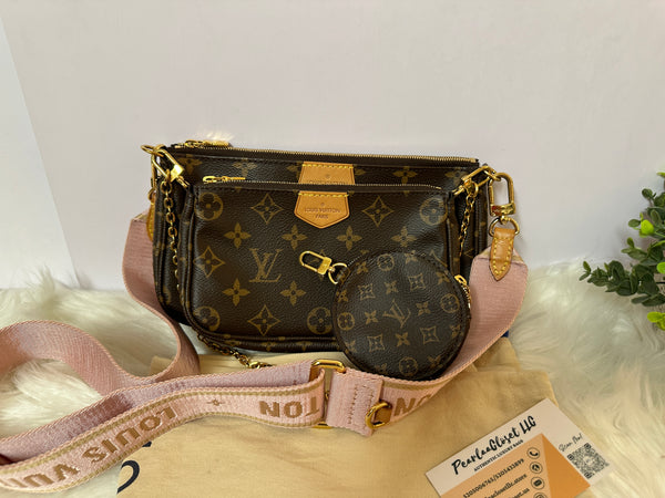 Louis Vuitton monogram crossbody bag with adjustable strap, showcasing the classic LV design in neutral tones.